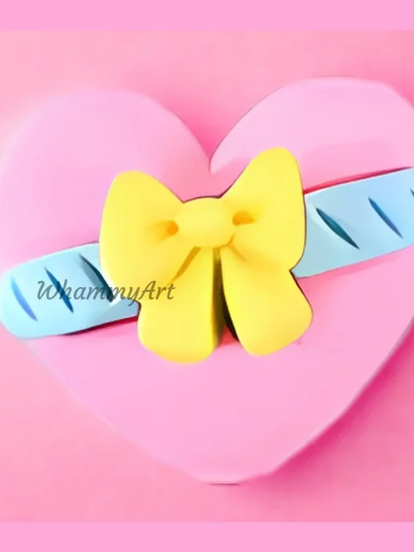 Corazon moño amarillo