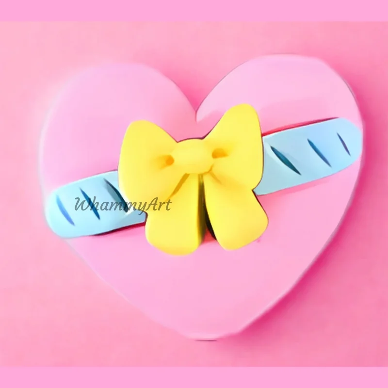 Corazon moño amarillo